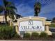 Entrance sign for Villagio Condominiums at 1135 Villagio Cir # 204, Sarasota, FL 34237