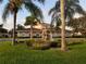 Community clubhouse with fountain and landscaping at 1135 Villagio Cir # 204, Sarasota, FL 34237