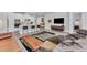 Living room with hardwood floors, modern furniture and access to the kitchen at 2563 Prospect St, Sarasota, FL 34239