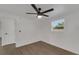 Well-lit bedroom with wood-look floors and a ceiling fan at 1054 W Baffin Dr, Venice, FL 34293