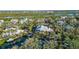 Aerial view showcasing home's location in waterfront community at 5309 Hidden Harbor Rd, Sarasota, FL 34242