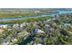 Bird's-eye view of a waterfront home nestled in lush surroundings at 5309 Hidden Harbor Rd, Sarasota, FL 34242