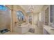 Elegant bathroom with soaking tub, shower, and double vanity at 5309 Hidden Harbor Rd, Sarasota, FL 34242