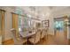 Elegant dining room featuring a large table and hardwood floors at 5309 Hidden Harbor Rd, Sarasota, FL 34242
