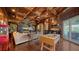 Relaxing game room with foosball table and built-in entertainment center at 5309 Hidden Harbor Rd, Sarasota, FL 34242