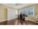 Bright home office features built-in cabinetry and hardwood floors at 5309 Hidden Harbor Rd, Sarasota, FL 34242