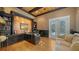 Spacious home office with built-in shelving and hardwood floors at 5309 Hidden Harbor Rd, Sarasota, FL 34242