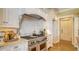 Bright kitchen featuring a center island and custom cabinetry at 5309 Hidden Harbor Rd, Sarasota, FL 34242