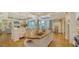 Large kitchen with island, custom cabinetry, and wood countertops at 5309 Hidden Harbor Rd, Sarasota, FL 34242
