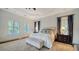 Bright main bedroom with window seat and cozy bedding at 5309 Hidden Harbor Rd, Sarasota, FL 34242