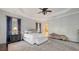 Main bedroom with plush carpet and chaise lounge at 5309 Hidden Harbor Rd, Sarasota, FL 34242