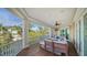 Spacious screened porch boasting comfortable seating and tranquil views at 5309 Hidden Harbor Rd, Sarasota, FL 34242