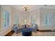 Relaxing sitting area with window seat and ottoman at 5309 Hidden Harbor Rd, Sarasota, FL 34242