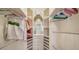 Large walk-in closet with ample hanging and shelving space at 5309 Hidden Harbor Rd, Sarasota, FL 34242