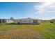 Large backyard with fire pit and plenty of space at 258 Seminole Nw Blvd, Port Charlotte, FL 33952