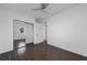 Bedroom with mirrored closet doors and wood-look tile floors at 258 Seminole Nw Blvd, Port Charlotte, FL 33952