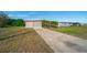 Single story home with driveway and landscaping at 258 Seminole Nw Blvd, Port Charlotte, FL 33952