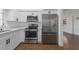 Modern kitchen features stainless steel appliances and white cabinetry at 258 Seminole Nw Blvd, Port Charlotte, FL 33952