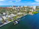 An aerial view of a waterfront home with a boat at the dock at 1358 Moonmist Dr # B4, Sarasota, FL 34242