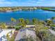 Aerial view of waterfront home with private dock and lush landscaping at 1358 Moonmist Dr # B4, Sarasota, FL 34242