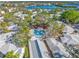 Community pool and surrounding buildings at 1358 Moonmist Dr # B4, Sarasota, FL 34242