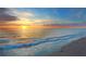 Stunning sunset over calm ocean waves at 1358 Moonmist Dr # B4, Sarasota, FL 34242