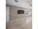 Light and airy bedroom with tiled floors and ceiling fan at 1358 Moonmist Dr # B4, Sarasota, FL 34242