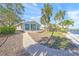 Single story home with a walkway leading to the entrance at 1358 Moonmist Dr # B4, Sarasota, FL 34242