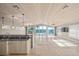 Island kitchen with water view and stainless steel appliances at 1358 Moonmist Dr # B4, Sarasota, FL 34242
