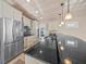 Well-equipped kitchen featuring granite countertops and custom cabinets at 1358 Moonmist Dr # B4, Sarasota, FL 34242