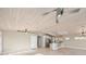 Open living space with kitchen access and high ceilings at 1358 Moonmist Dr # B4, Sarasota, FL 34242