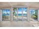 Spacious living area showcasing stunning water views at 1358 Moonmist Dr # B4, Sarasota, FL 34242