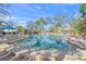 Inviting community pool with lounge chairs at 1358 Moonmist Dr # B4, Sarasota, FL 34242