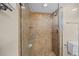Clean shower with tile surround and glass enclosure at 1358 Moonmist Dr # B4, Sarasota, FL 34242