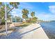 Waterfront home with a pathway leading to the dock at 1358 Moonmist Dr # B4, Sarasota, FL 34242