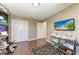 Bright bedroom with wood floors and double doors at 14118 Florida Rosemary Dr, Bradenton, FL 34211