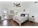 Spacious bedroom with wood flooring and backyard view at 14118 Florida Rosemary Dr, Bradenton, FL 34211