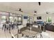 Spacious community room with comfortable seating and TV at 14118 Florida Rosemary Dr, Bradenton, FL 34211