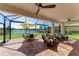 Relaxing covered patio overlooking a lake at 14118 Florida Rosemary Dr, Bradenton, FL 34211