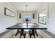Charming dining area with a farmhouse table and built-in bench seating at 14118 Florida Rosemary Dr, Bradenton, FL 34211