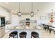 Modern kitchen featuring granite countertops and an island with seating at 14118 Florida Rosemary Dr, Bradenton, FL 34211