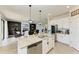 Island kitchen with granite countertops, stainless steel appliances, and open layout at 14118 Florida Rosemary Dr, Bradenton, FL 34211