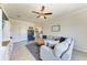 Bright living room with sectional sofa and built-in storage at 14118 Florida Rosemary Dr, Bradenton, FL 34211
