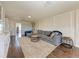 Comfortable loft area with sectional sofa and a large area rug at 14118 Florida Rosemary Dr, Bradenton, FL 34211
