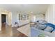Spacious loft with gray sectional sofa and built-in entertainment center at 14118 Florida Rosemary Dr, Bradenton, FL 34211