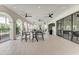 Relaxing outdoor patio with seating and ceiling fans at 14118 Florida Rosemary Dr, Bradenton, FL 34211