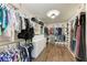 Large walk-in closet with ample shelving and hanging space at 14118 Florida Rosemary Dr, Bradenton, FL 34211