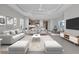 Spacious living room features stylish furniture and an open floor plan at 14611 Barefoot Ln, Parrish, FL 34219