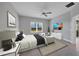 Bright main bedroom with large windows and plenty of space for furniture at 14611 Barefoot Ln, Parrish, FL 34219