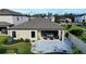 Drone shot of backyard featuring a beautiful paver patio and manicured lawn at 12661 Oak Hill Way, Parrish, FL 34219